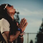 Rap artist praying